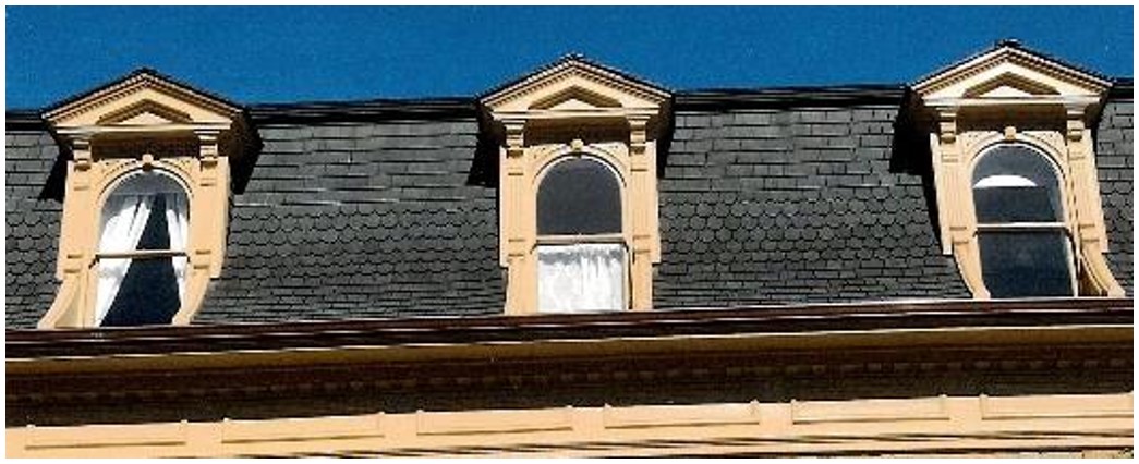 After: detail of repaired and added dormers at completion